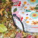 Light Floral Ceramic Coasters with Metal Stand (Set of 4)