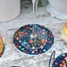Dark Floral Ceramic Coasters with Metal Stand (Set of 4)